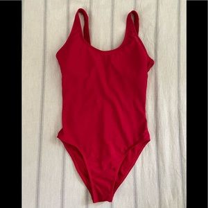 Red one piece bathing suit.